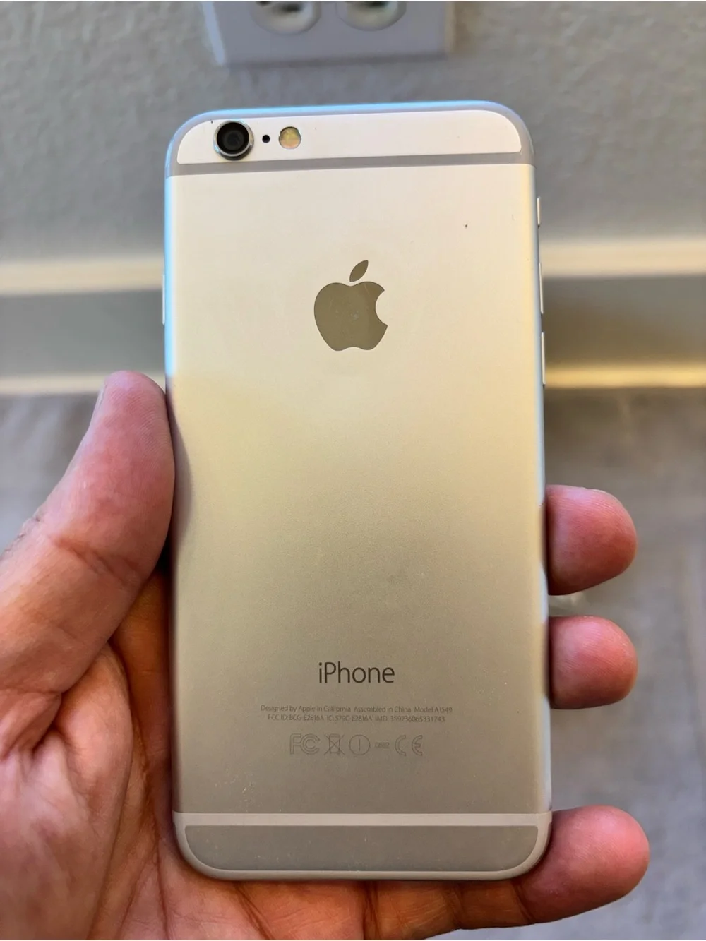 Apple iPhone6 64GB White with Blue Braided Charging Cable and White Earbuds